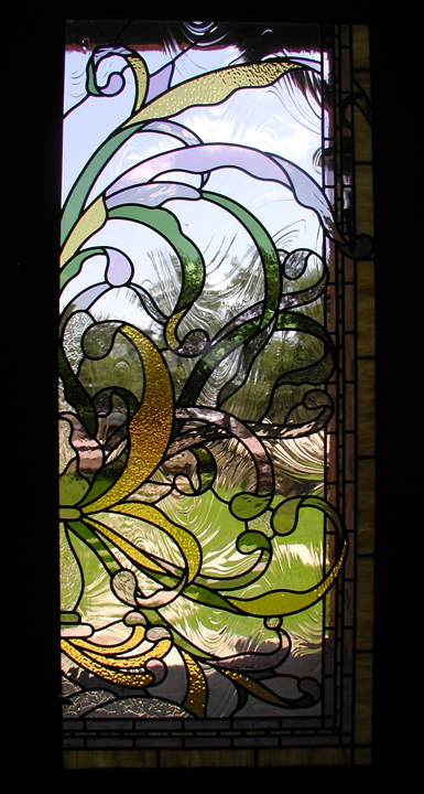 Art Nouveau entryway doors and transom